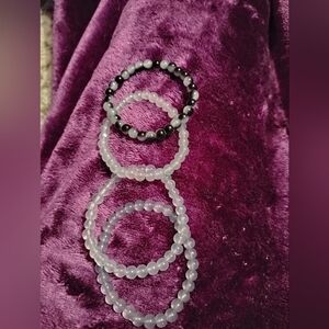 Handmade four piece black and gray minimal bracelet set